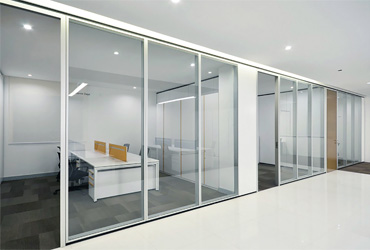 Framed glass partition